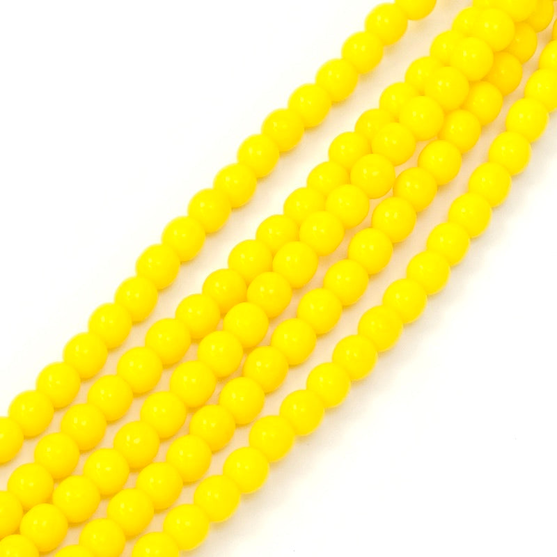 Fil de perles de Bohème rondes 4mm jaune opaque