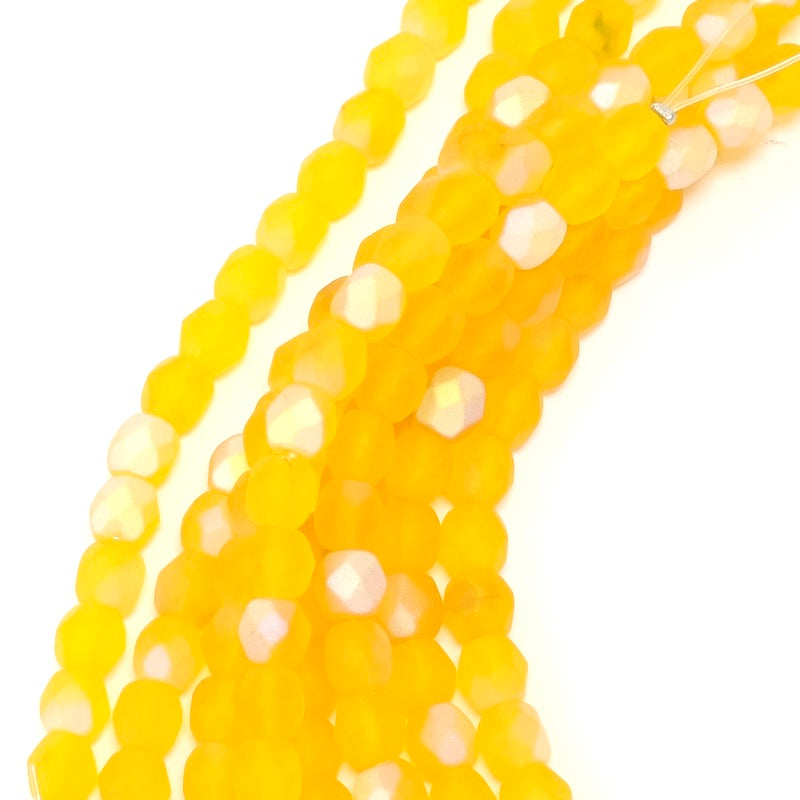 Fil de perles de Bohème rondes facettées 6mm orange irisé AB mat