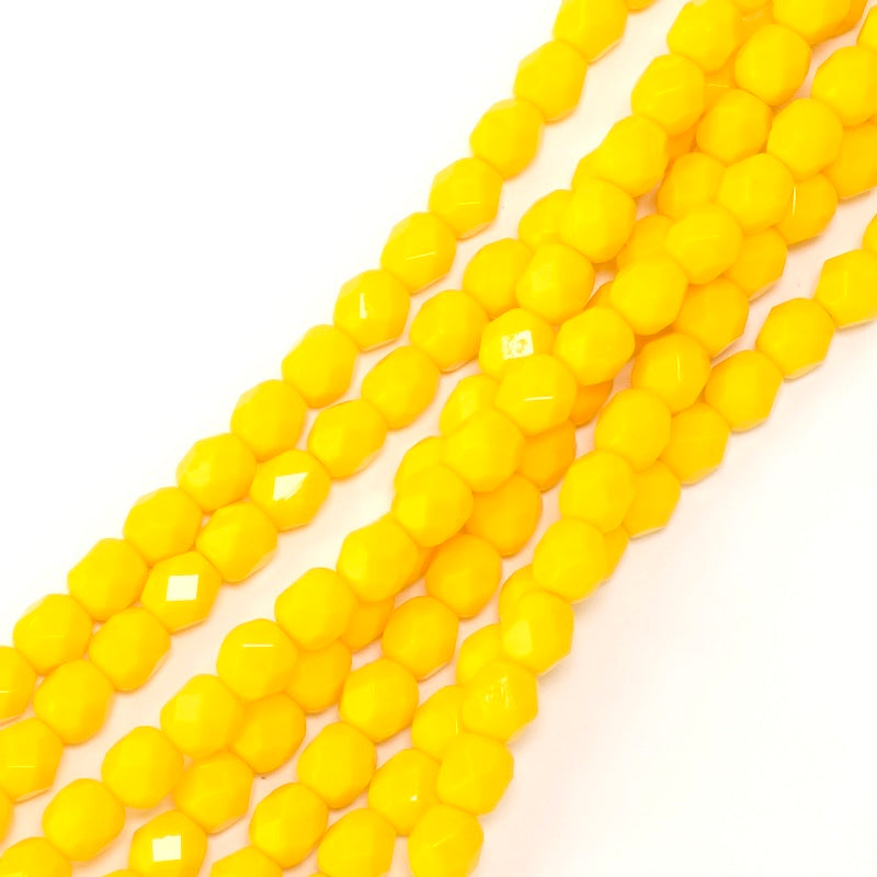 Fil de perles de Bohème rondes facettées 6mm jaune orangé opaque
