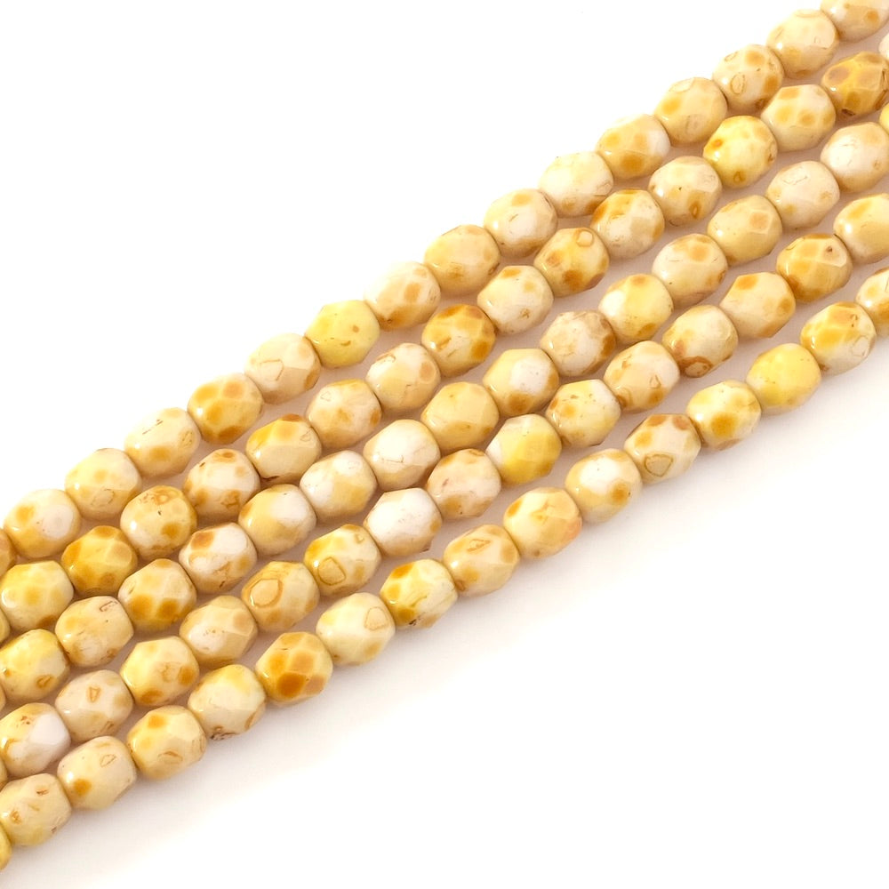Fil de perles de Bohème rondes facettées 4 mm nuances de jaune