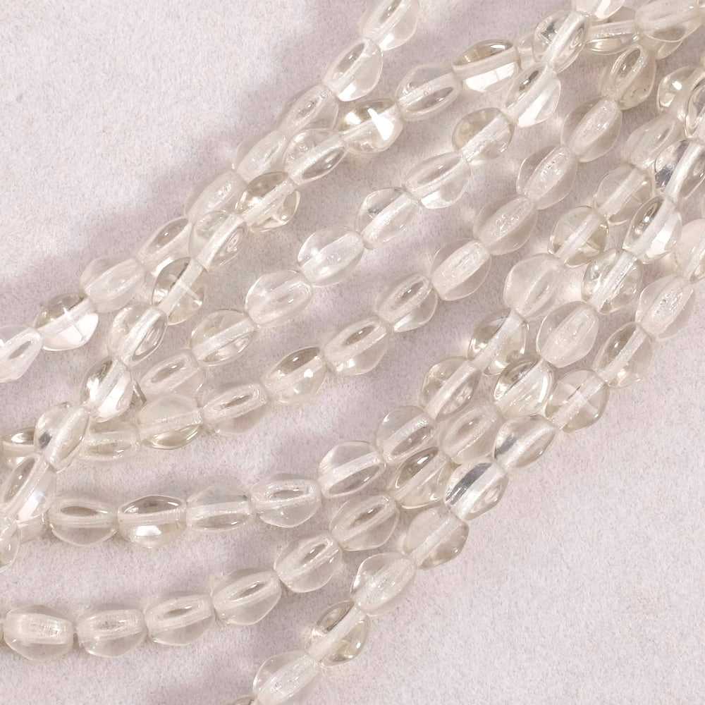 Fil de perles de Bohème Olives facettées 5mm taupe transparent