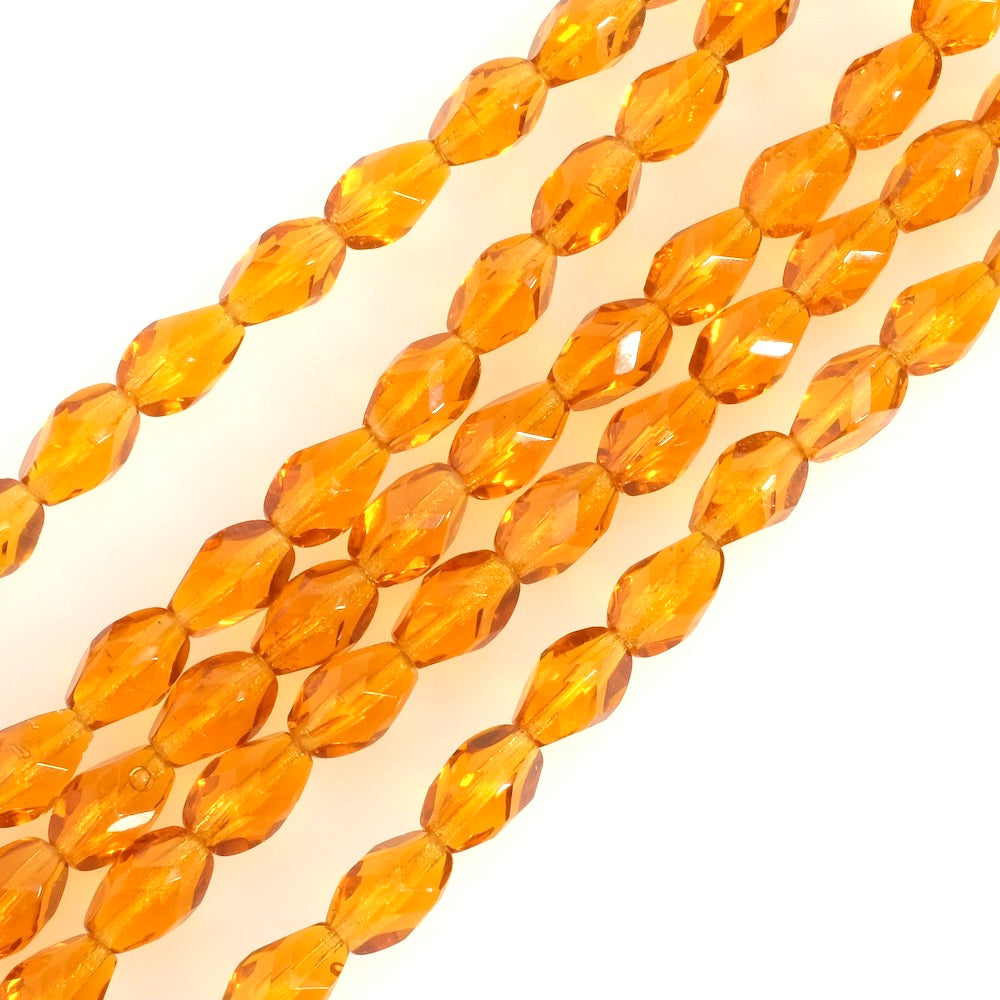 Fil de perles de Bohème Olives facettées 9x6mm ambre transparent
