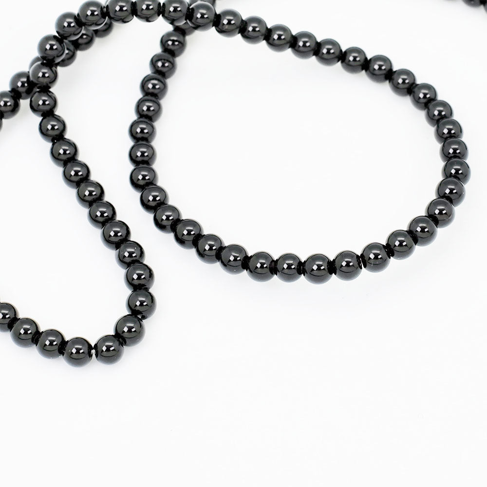 Fil de 90 perles rondes 4mm d'Agate naturelle Noire