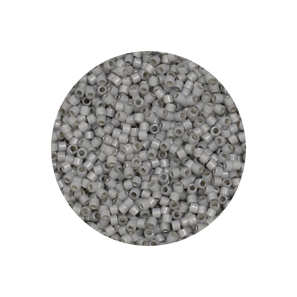 8 grammes de perles Miyuki Délica 11/0 Silver Lined Light Smoke Opal DB1455