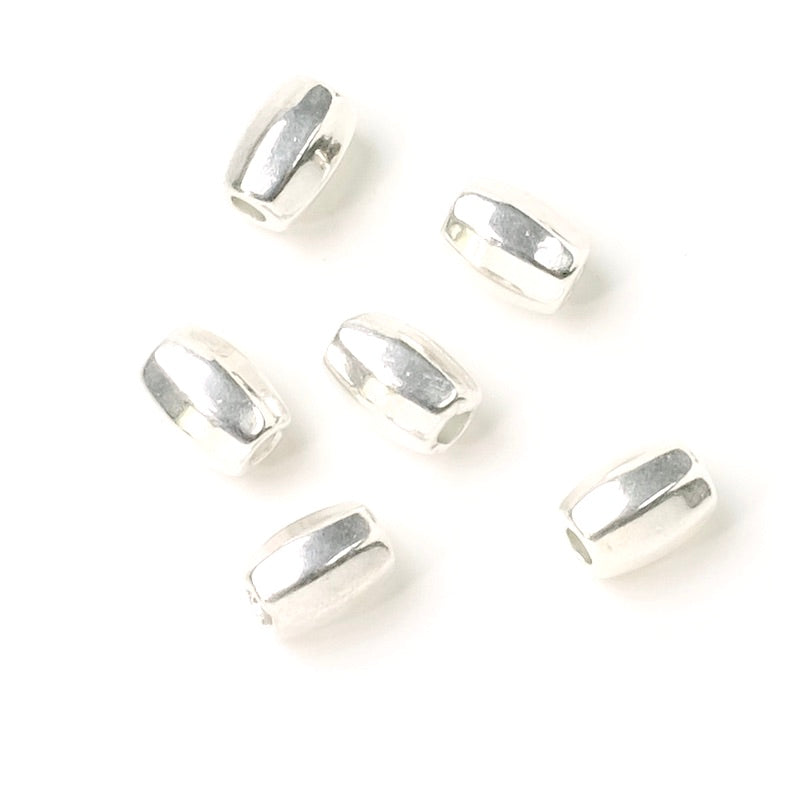 6 perles ovales facettées en métal Argenté