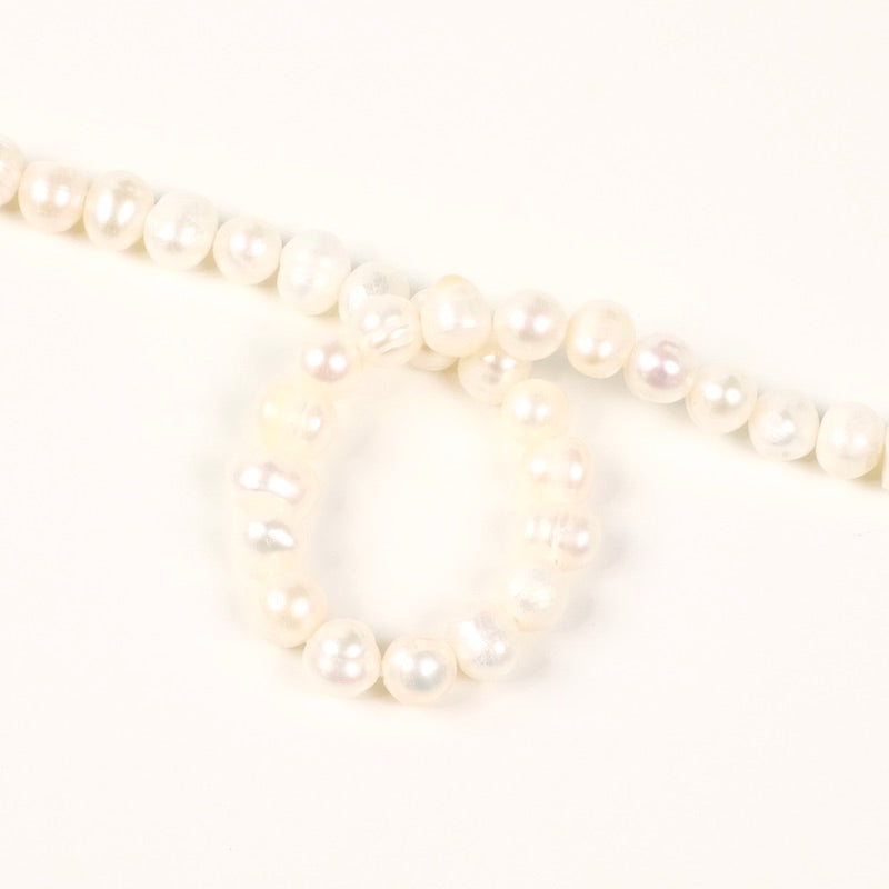 Fil de perles 5/6mm irrégulières de Nacre naturelle