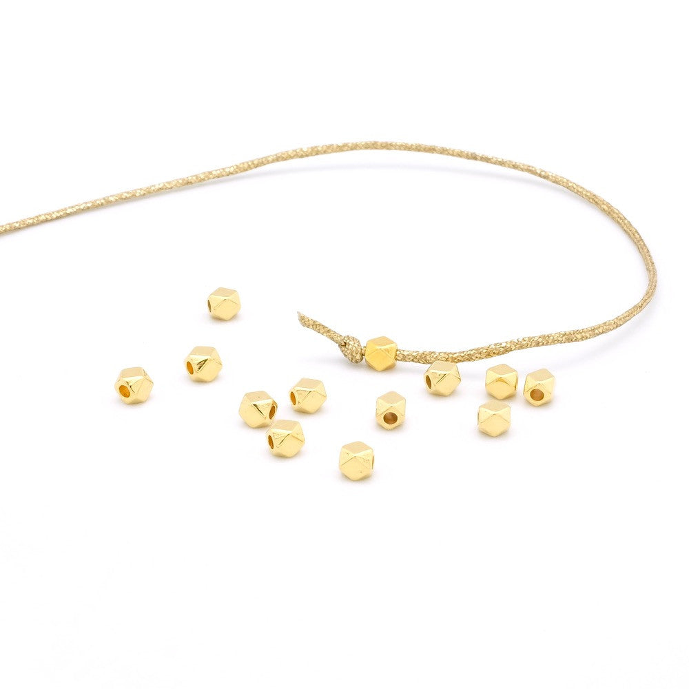 10 perles polygone à facettes en Zamak doré à l'or fin 24K