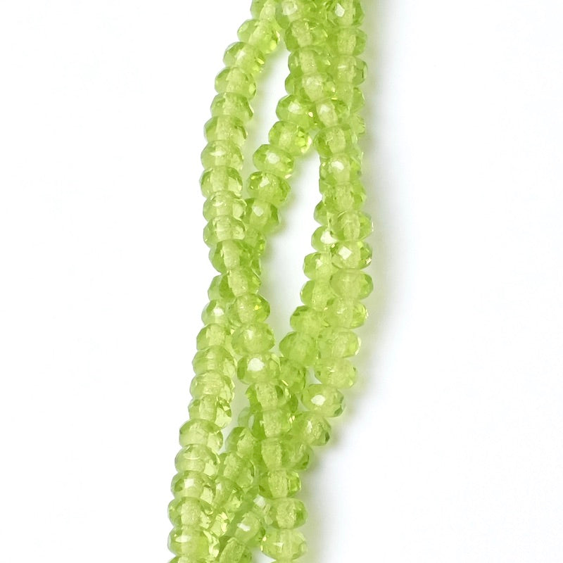 Fil de perles de Bohème facettées vert transparent 2x4mm