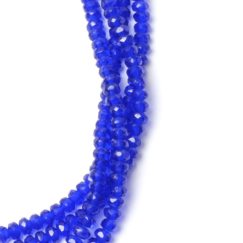 Fil de perles de Bohème facettées bleu nuit transparent 2x3mm