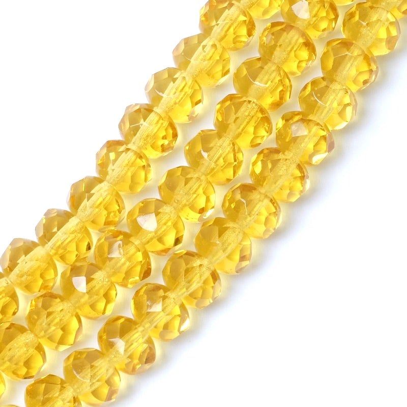Fil de perles de Bohème facettées corail transparent 6x8mm