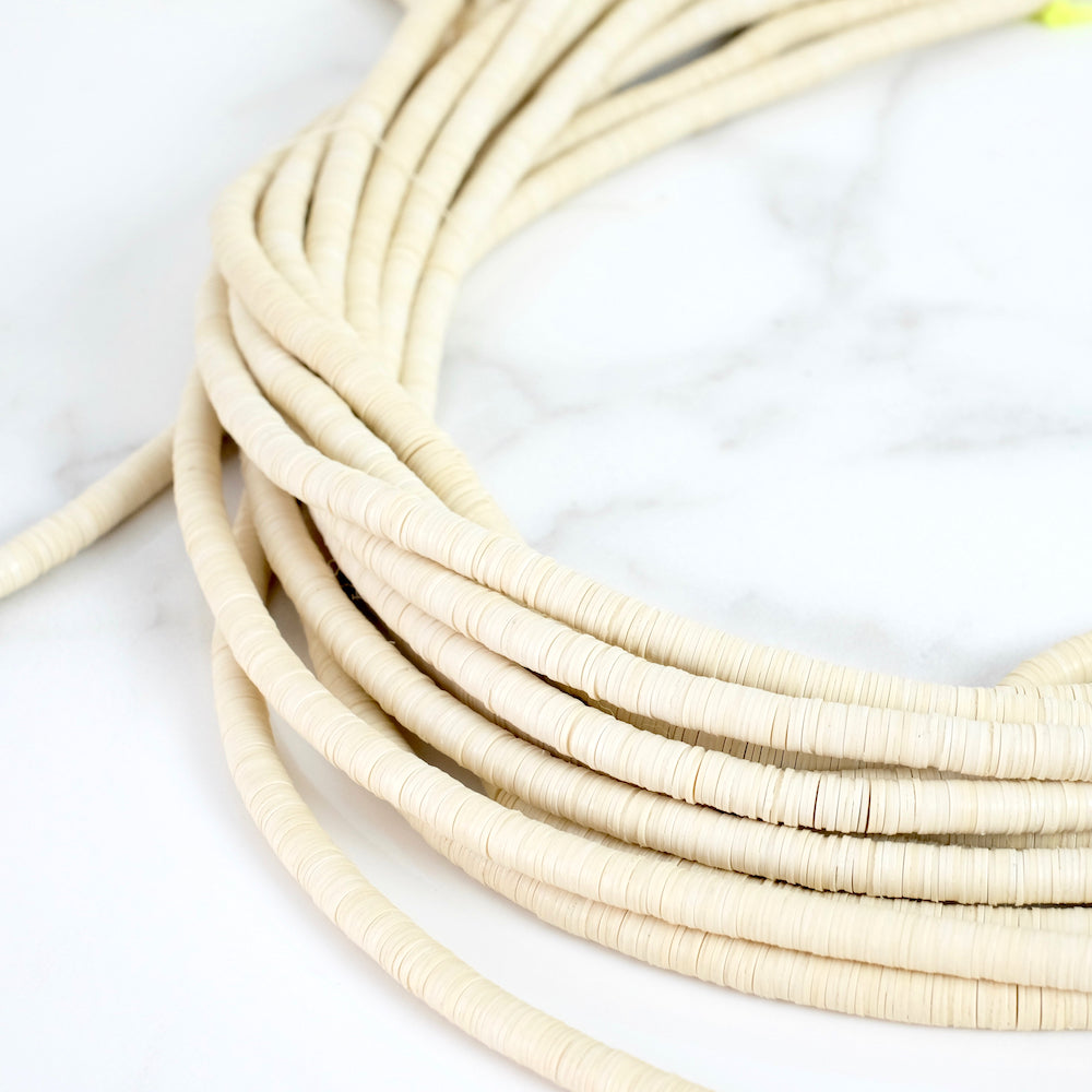 Véritables Perles Heishi 6mm de vinyle Vulcanite africain Ivoire