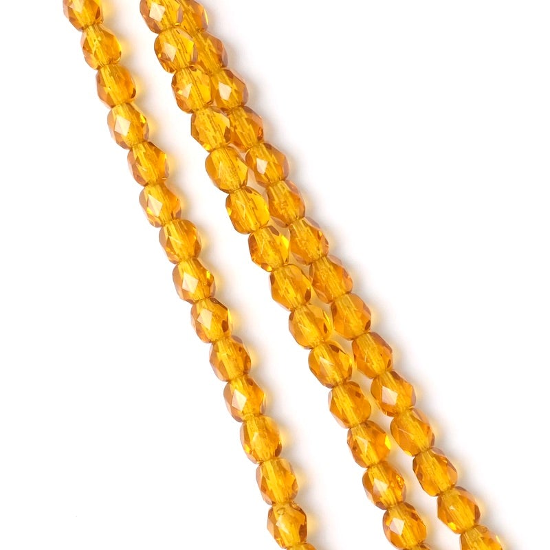 Fil de perles de Bohème rondes facettées orange transparent 4mm