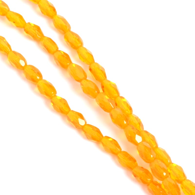 Fil de perles de Bohème Olives facettées 6x4mm orange transparent