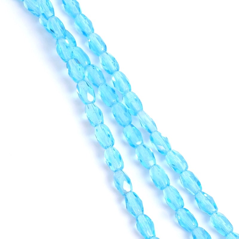 Fil de perles de Bohème Olives facettées 6x4mm bleu azur transparent