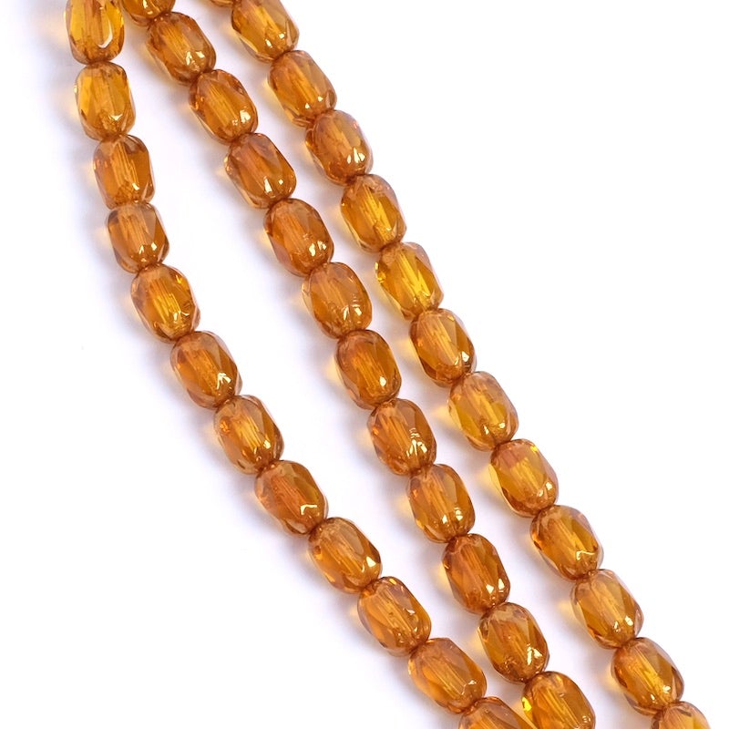 Fil de perles de Bohème baroque facettée 6x4mm orange rouille 