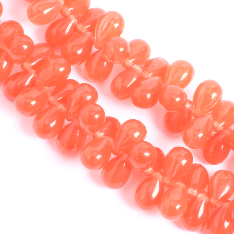 Fil de perles de Bohème gouttes 6x9mm rouge transparent