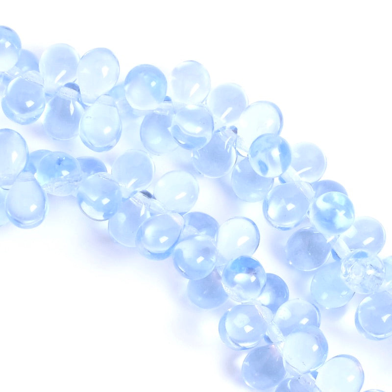 Fil de perles de Bohème gouttes 5x7mm bleu transparent