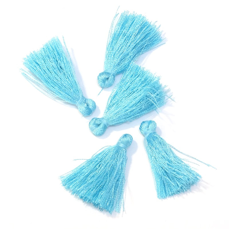 6 Pompons en polyester 30mm Bleu ciel