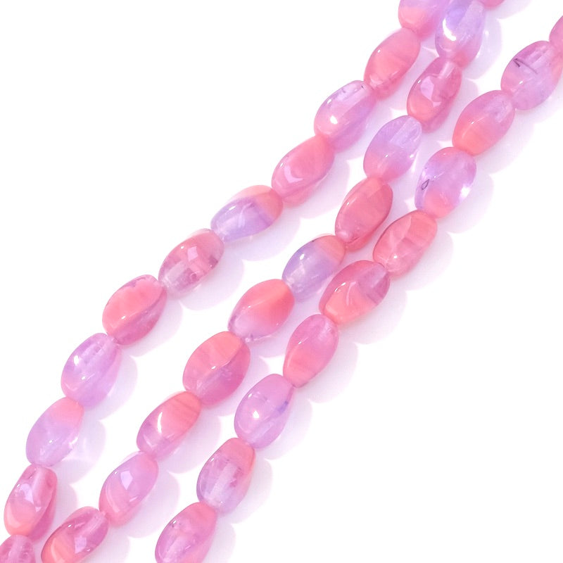 Fil de perles de Bohème ovales twistées 9x6mm Rose violet clair
