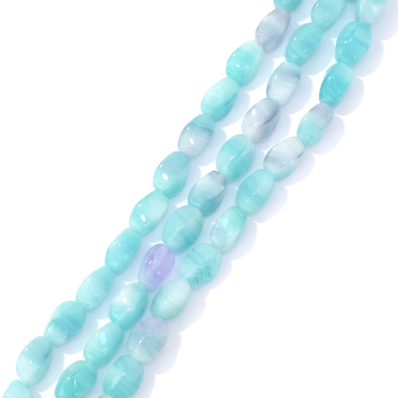 Fil de perles de Bohème ovales twistées 9x6mm Bleu violet pastel