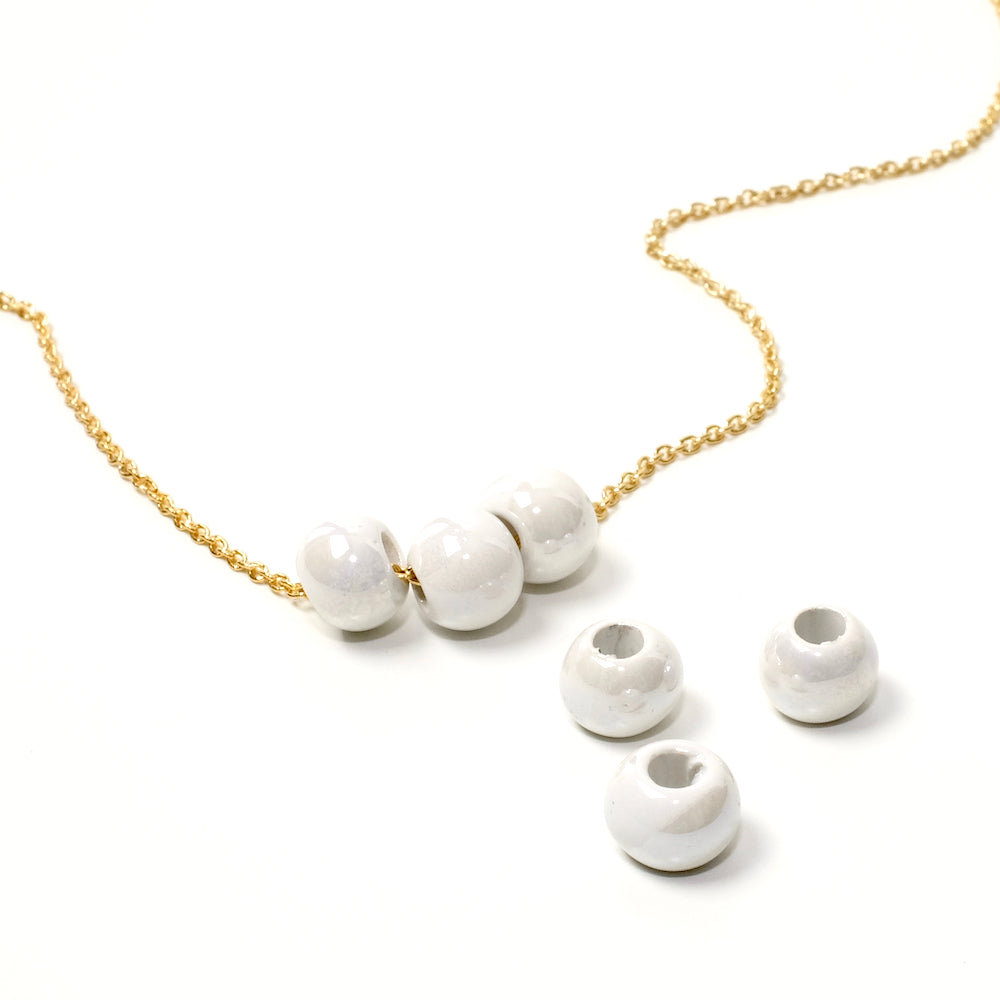 6 Perles rondes en céramique artisanale Blanc nacré