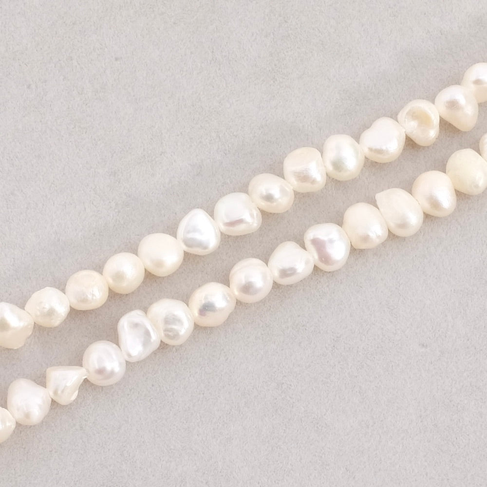 Fil de petites perles 5mm irrégulières de Nacre naturelle