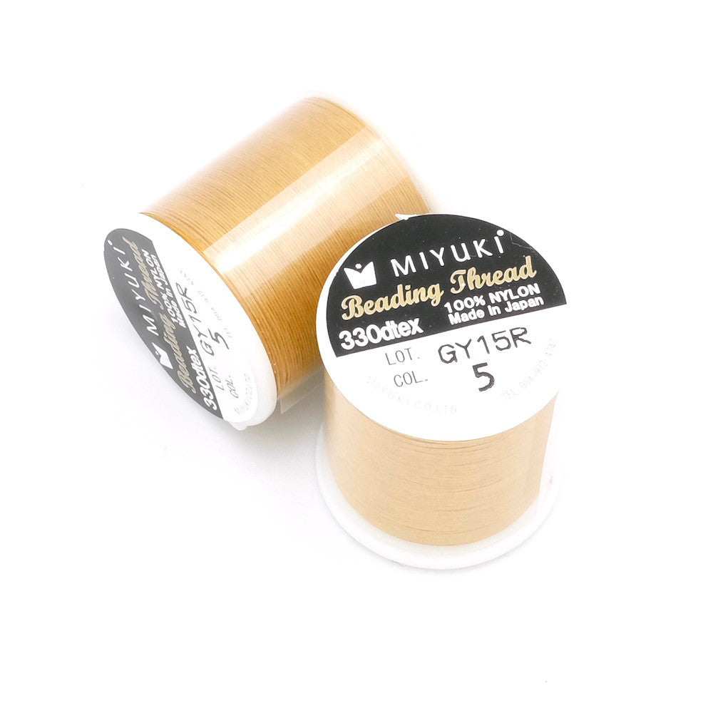 Bobine de 50 mètres de fil nylon Miyuki Beading thread 0,25mm Gold N°5 -  Perles Corner