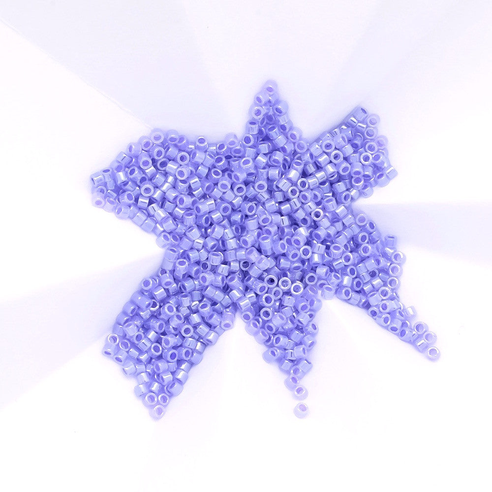 8 grammes de perles Miyuki Délica 11/0 Lined crystal Purple N°249