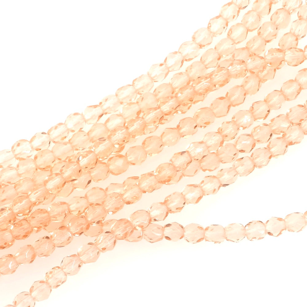 Fil de perles de Bohème rondes facettées 4 mm rose pêche transparent 