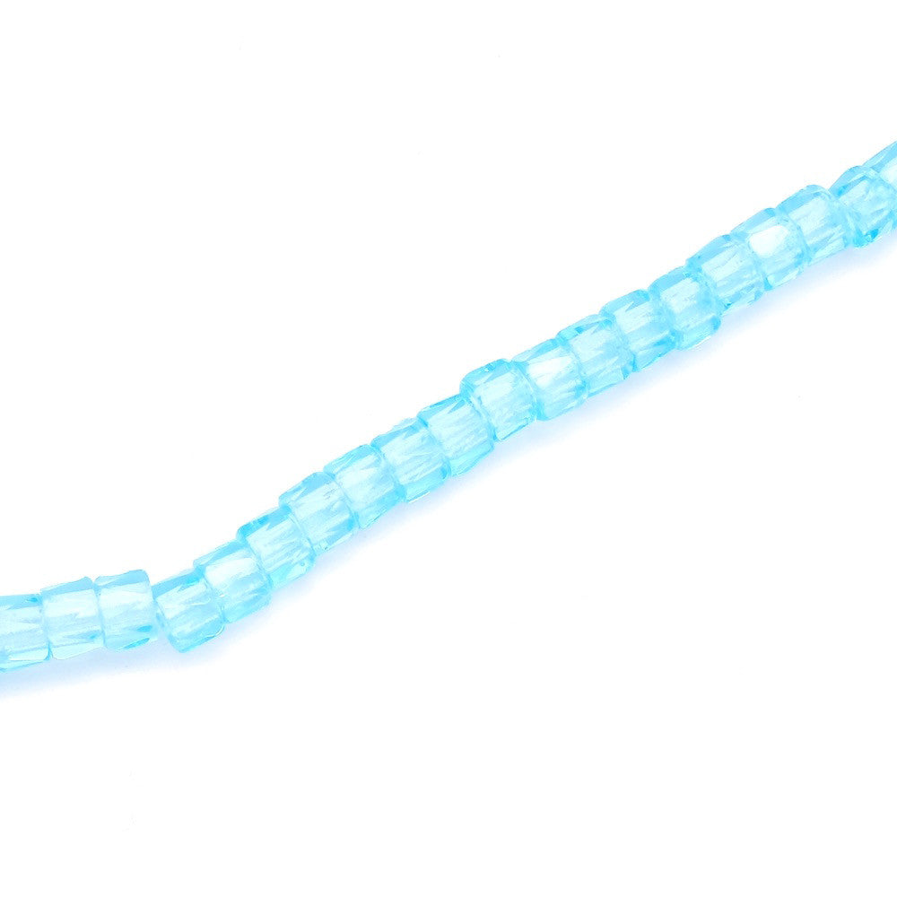 Fil de 29 véritables perles de Bohème en verre anneaux à facettes bleu transparent