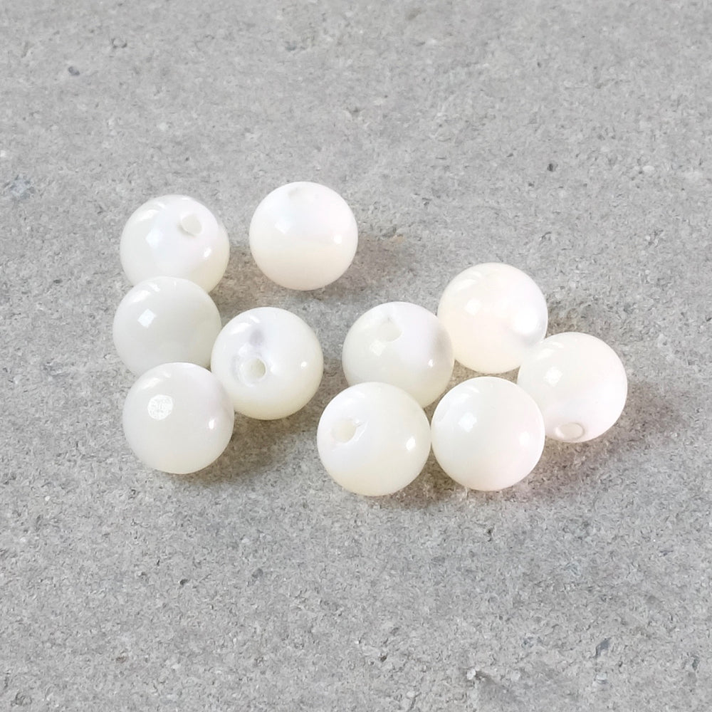 10 perles rondes 6mm de Nacre blanche