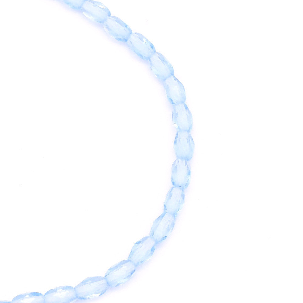 Fil de 20 véritables perles de Bohème en verre ovales facettées bleu transparent