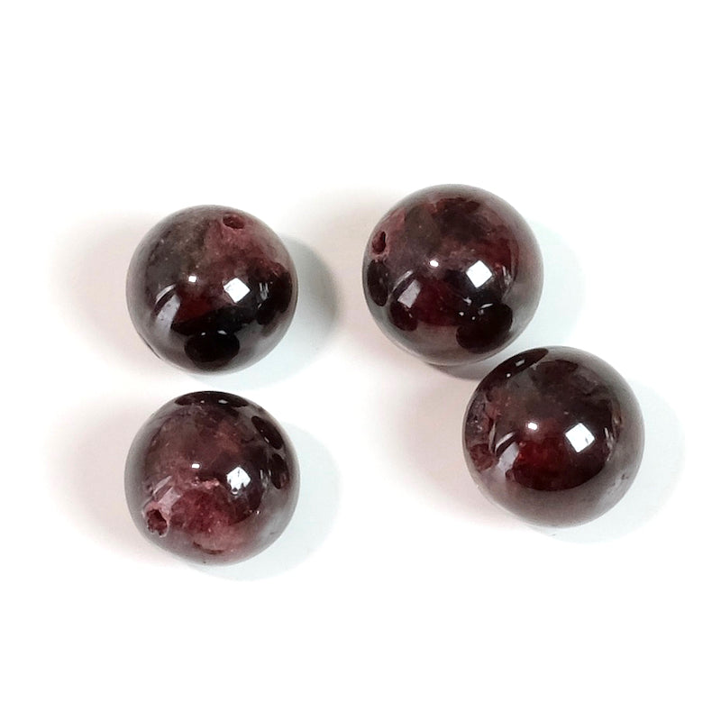 4 perles rondes naturelles de Grenat de 10mm.