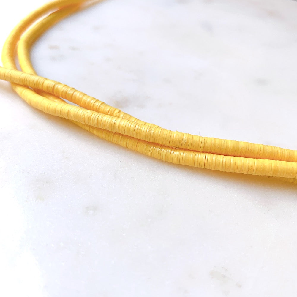 Véritables Perles Heishi 6mm de vinyle Vulcanite africain Jaune poussin