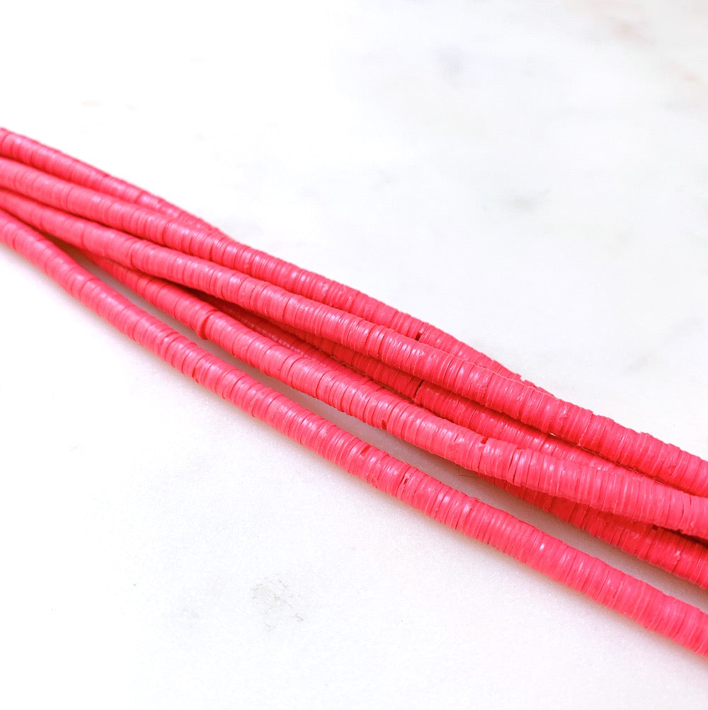 Véritables Perles Heishi 4mm de vinyle Vulcanite africain Rose fluo