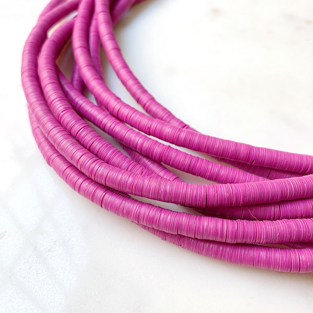 Véritables Perles Heishi 6mm de vinyle Vulcanite africain Magenta
