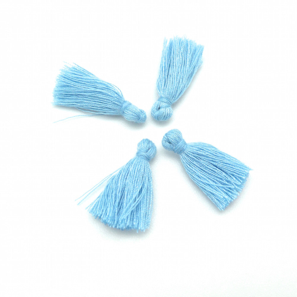 Lot de 4 Petits Pompons en coton 25mm bleu clair