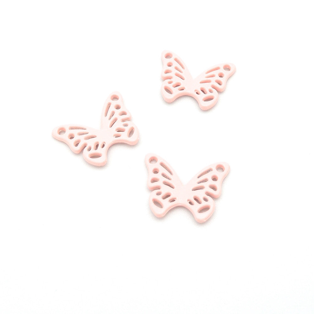 Connecteur papillon en métal teinté Pink coral