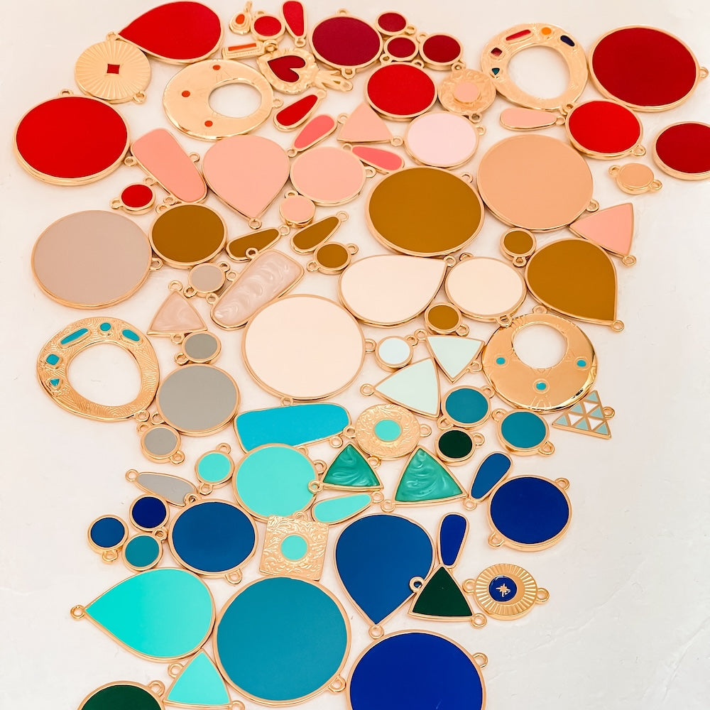 Enamelled and Zamak pendants