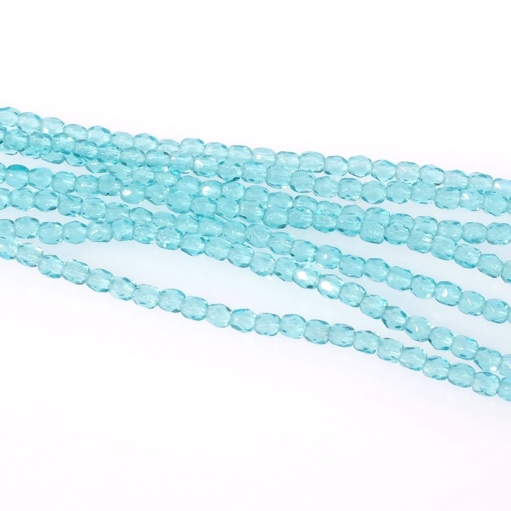 Strand of round faceted Bohemian beads 3mm light turquoise transparent 