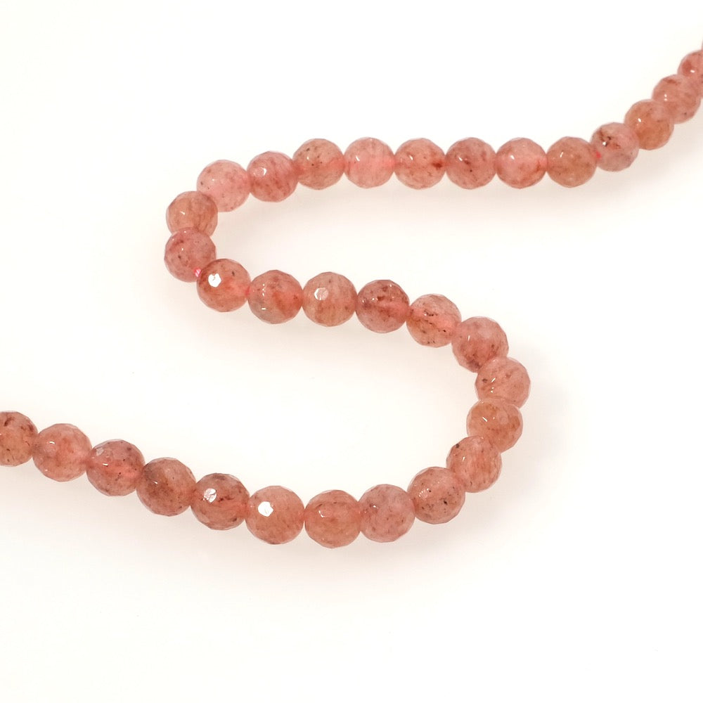 Strand of 4mm faceted round natural Strawberry Quartz beads
