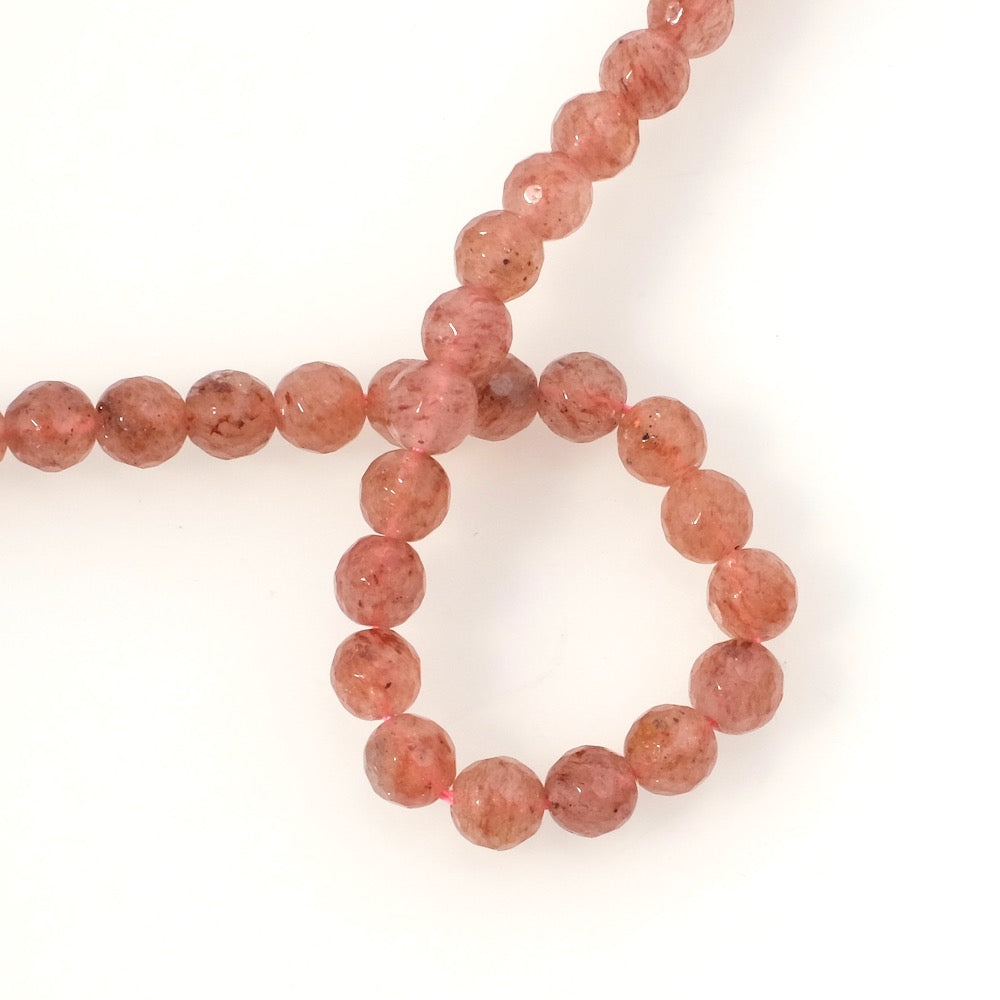 Strand of 4mm faceted round natural Strawberry Quartz beads