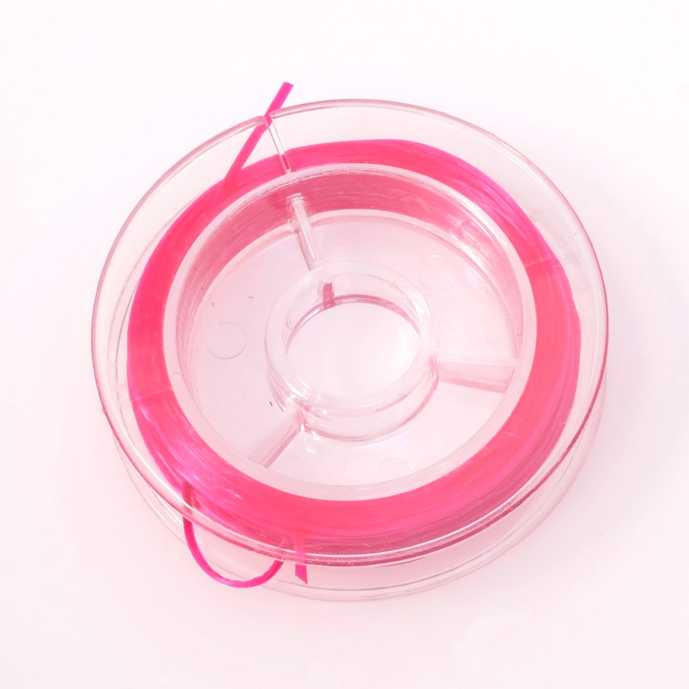 Spool of 10 meters of flat elastic thread 0.6mm Fluorescent Pink