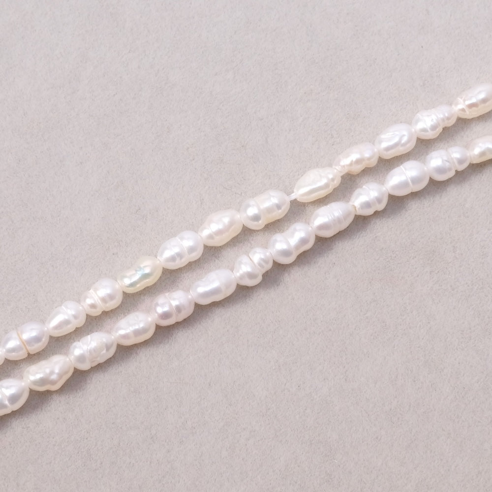 Strand of 3x6mm irregular oval natural Mother-of-Pearl beads