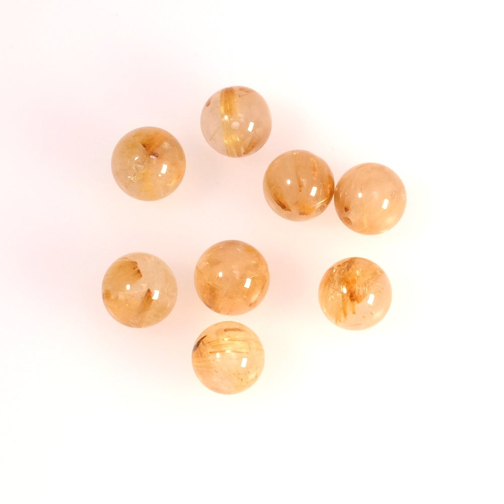 Strand of 8mm round natural Rutilated Quartz beads