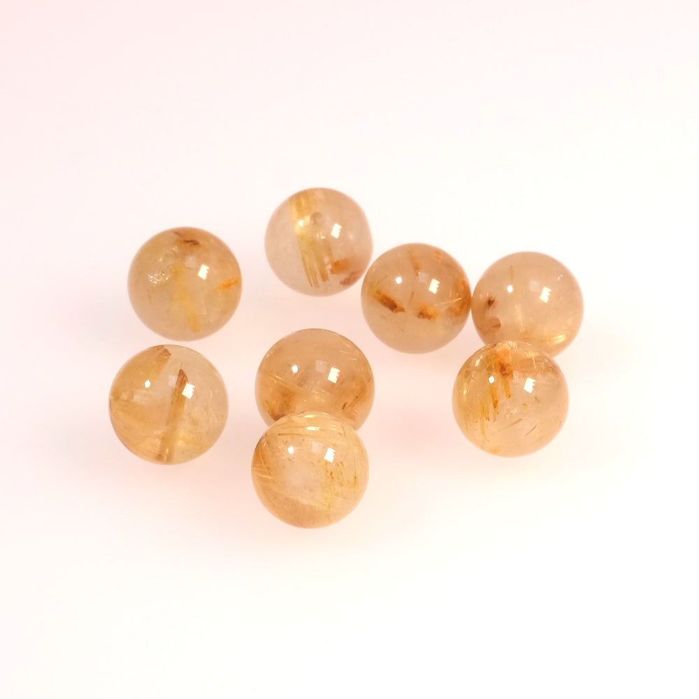 Strand of 8mm round natural Rutilated Quartz beads