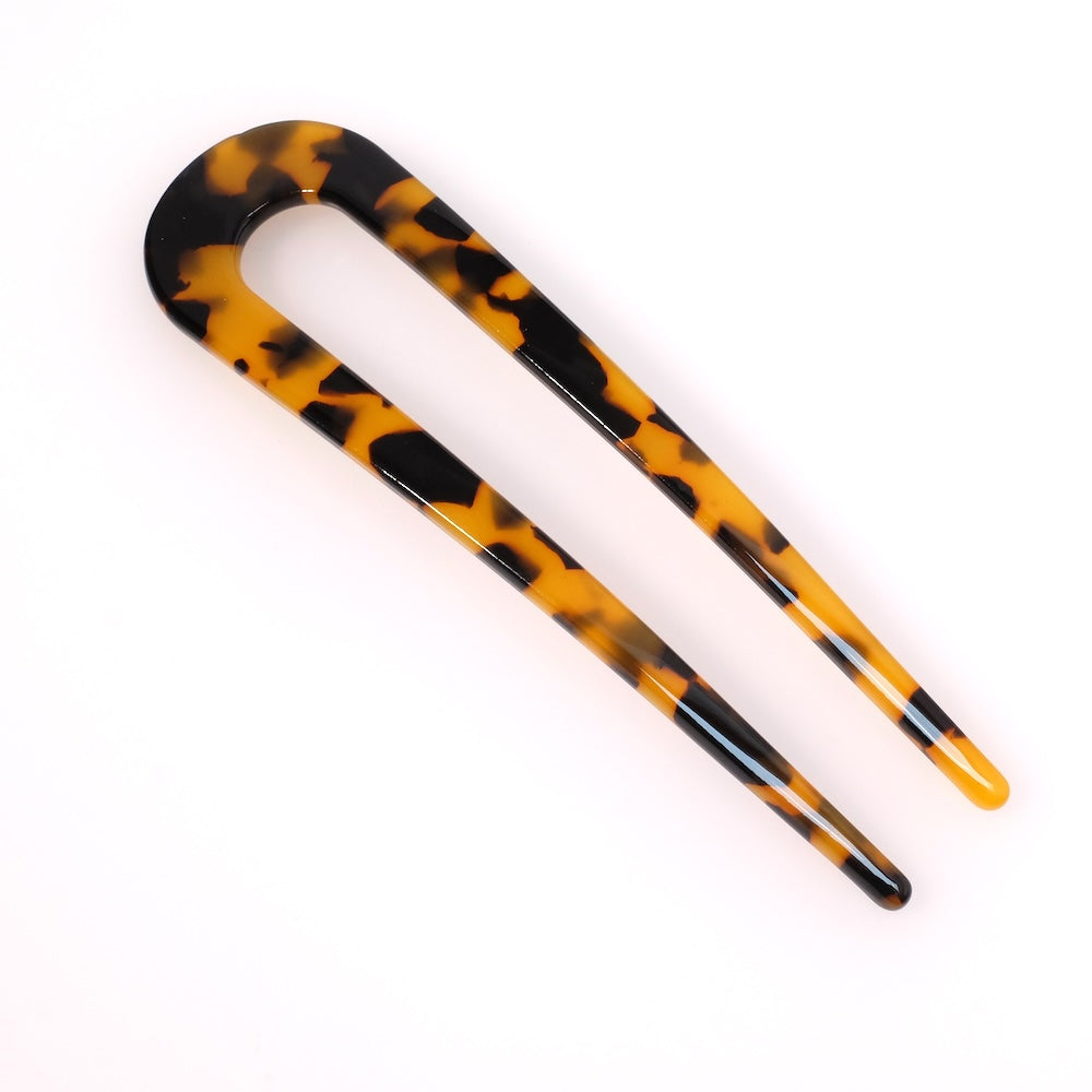 Hair pin peaks in brown acetate