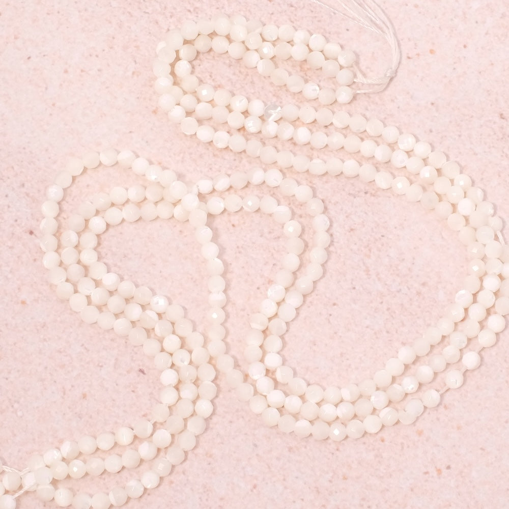 Strand of 3mm faceted beads in natural white Mother-of-pearl