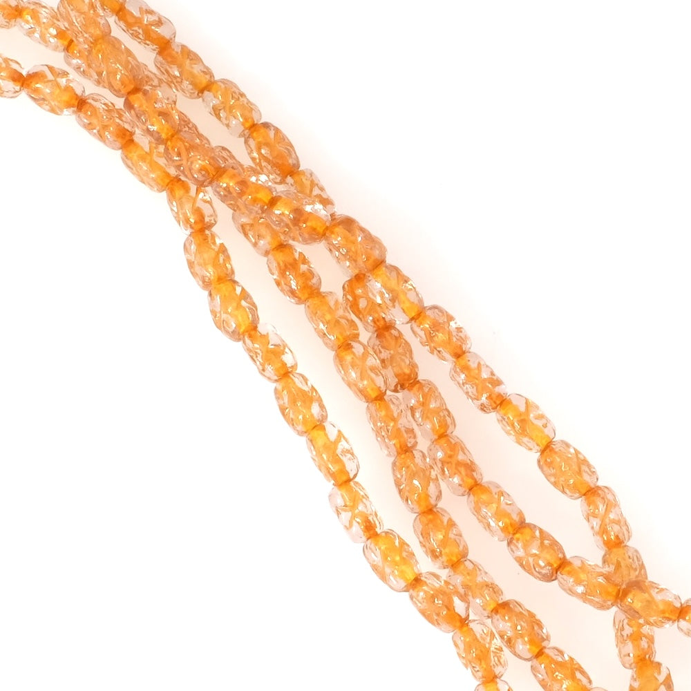 Strand of rectangular Bohemian glass beads, 6x4mm, with transparent orange pattern