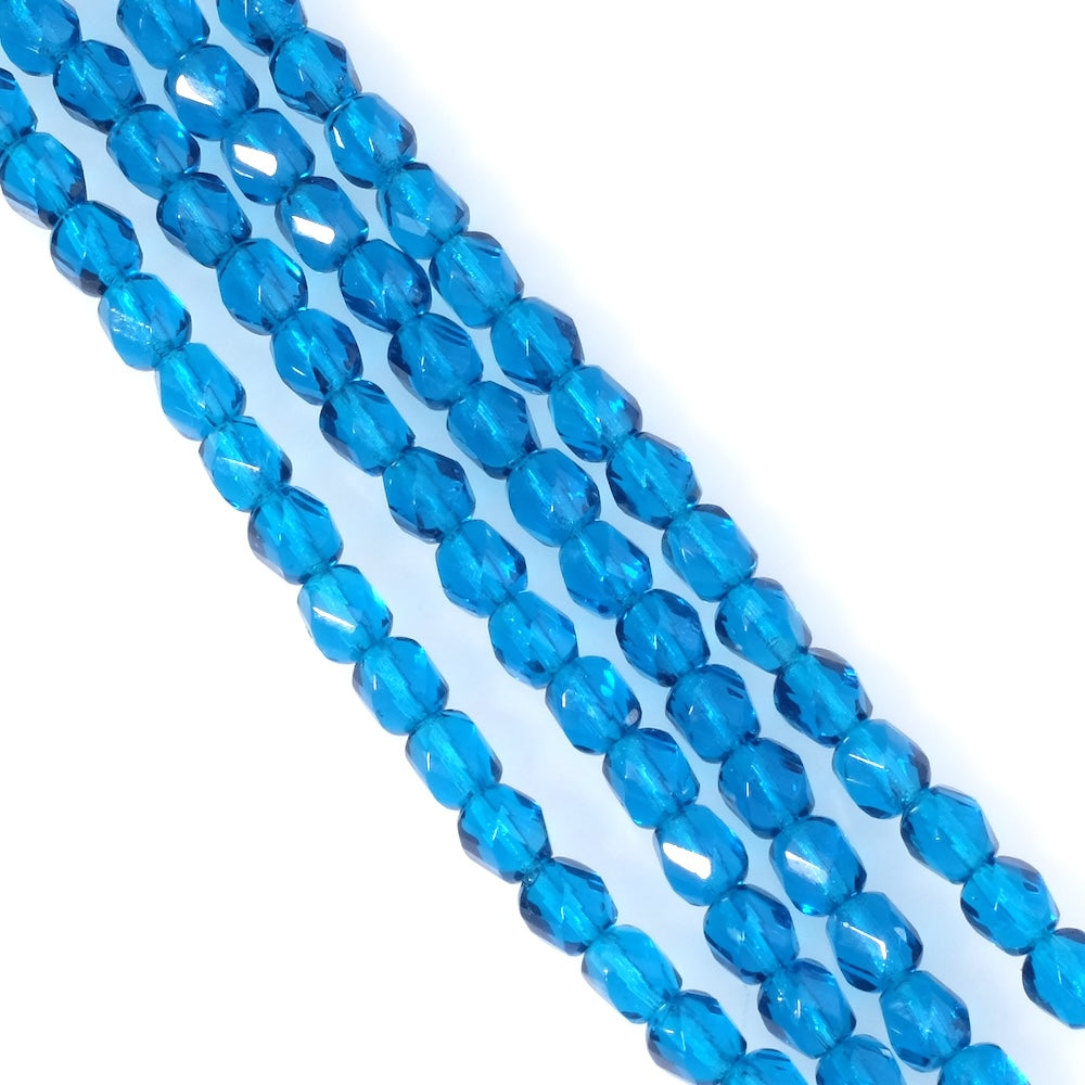 Strand of 6mm Faceted Round Bohemian Beads, Transparent Blue